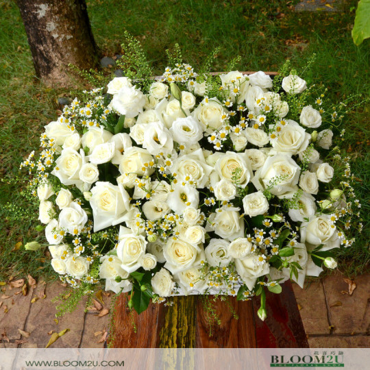 White roses flower basket
